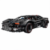 A 3,927-piece 1:8 armored concept supercar in matte frosted black with butterfly doors, a retractable roof module and steering linkage, RC-upgradeable. 