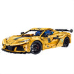 A 3,372-piece 1:8 track-edition yellow concept supercar with racing stripes, red calipers and exposed gears.  RC-upgradeable with 6 electric functions. 