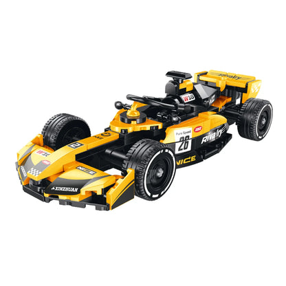A 392-piece yellow-and-black formula-style racing car that rebuilds into a studio camera. Track-style display base, engraved nameplate, collectible 4-car series. Original BrickRoyal set, ages 14+.
