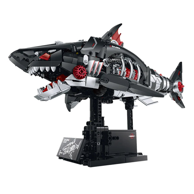 BRICKROYAL 1100pcs cyber mechanical shark building set with factory built-in motor system, smoke atomizer, LED lights and multi-part automatic movement. Batteries not included. Suitable for ages 14+, ideal for mechanical assembly, room decoration and tech hobby gifts.