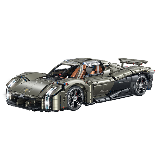 A 3,728-piece 1:8 electroplated gunmetal-grey concept supercar with an open-top body and open-armour display mode. RC-upgradeable. Collectible model, 14+.