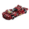 A 3,928-piece 1:8 combat-style supercar in electroplated red with black camo and a detachable serrated front guard. Static display, RC-upgradeable. 