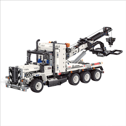 A 1,288-piece 6-in-1 RC wrecker tow truck with a working crane, plus five physics-demo rebuilds. Full motor kit included. STEM collectible, 14+.