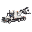 A 1,288-piece 6-in-1 RC wrecker tow truck with a working crane, plus five physics-demo rebuilds. Full motor kit included. STEM collectible, 14+.