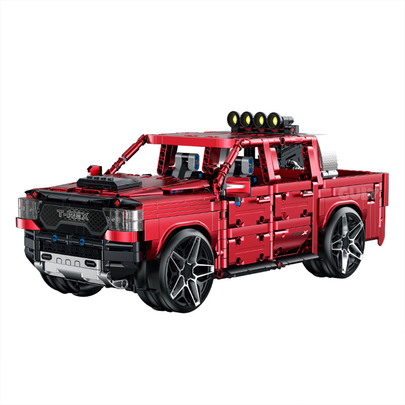 A 1,349-piece 1:14 electroplated-red off-road pickup with roof spotlights, openable doors and tailgate. Static display, RC-upgradeable for 360° drift & mist. 