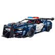 A 3,975-piece 1:8 Neptune-blue widebody police-style supercar with a red/blue light bar, butterfly doors and a twin-turbo engine. Static, RC-upgradeable. 14+.