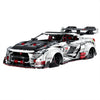 A 3,939-piece 1:8 widebody racing car in white, black & red with linkage steering and adjustable wing. Static display, RC-upgradeable with steam smoke.14+.